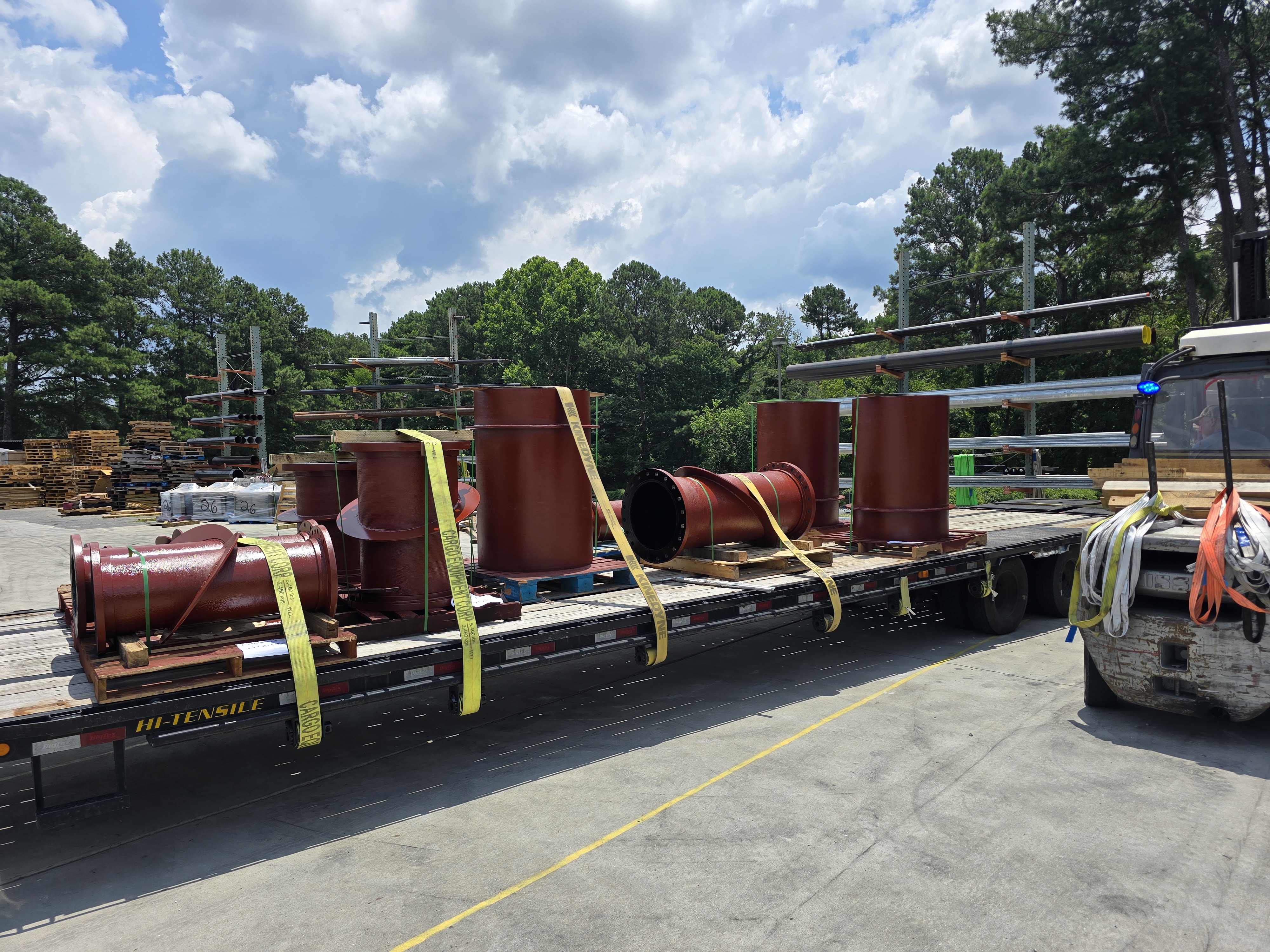 Fabricated flanged ductile iron pipe secured on a Central Pipe & Supply delivery truck